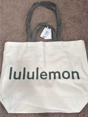 lululemon athletica Cream Canvas Tote with khaki green Logo and Handles